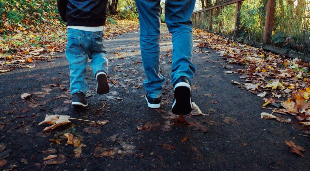 dad walking with his son